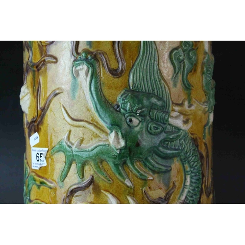 65 - 20th century Chinese Sancai Pottery Stickstand decorated with a Dragon, 48cms high