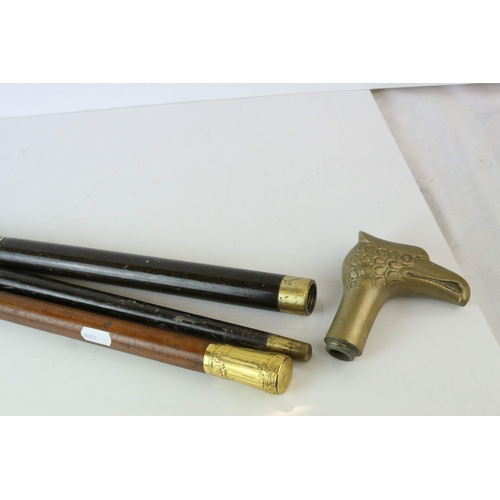 67 - Malacca Walking Stick with Yellow Metal covered Handle together with another Walking Stick with Bras... 