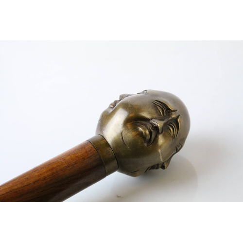 68 - Walking Stick with Bronze Four Head Buddha Knob