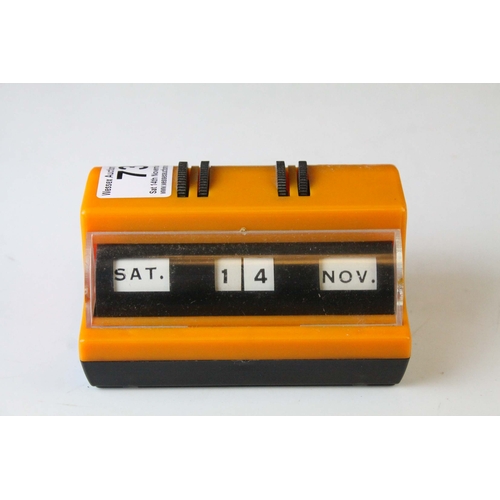 73 - Mid 20th century Retro Orange and Black Plastic Perpetual Desk Calendar, 11cms long