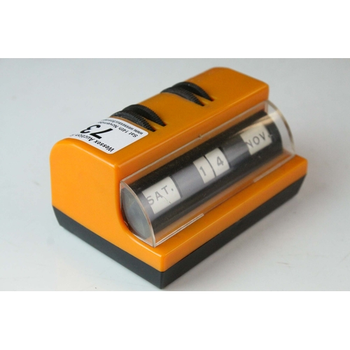 73 - Mid 20th century Retro Orange and Black Plastic Perpetual Desk Calendar, 11cms long