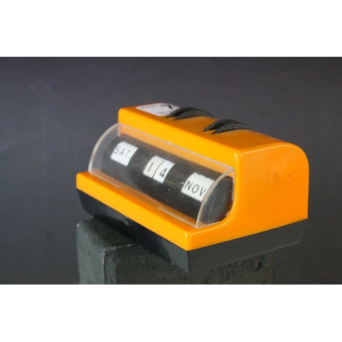 73 - Mid 20th century Retro Orange and Black Plastic Perpetual Desk Calendar, 11cms long