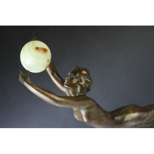 80 - Bronze Effect Art Deco Style Figurine holding an Onyx Ball and stood on an Onyx Plinth, 36cms high