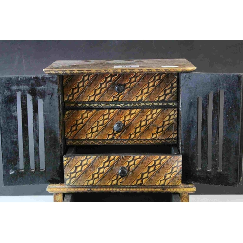 84 - Wooden Table Top Cabinet with a painted design including Flowers, comprising two pierced doors and f... 