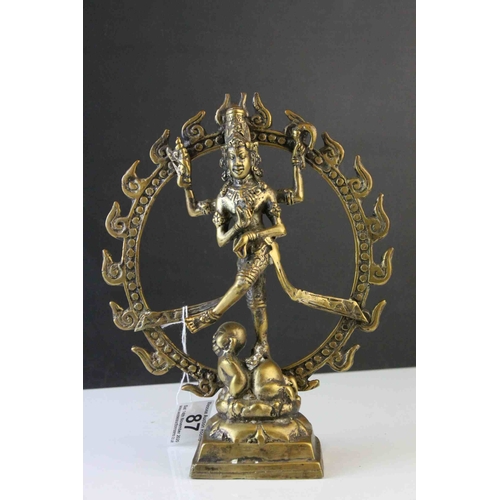 87 - Vintage Brass Statue of an Indian Deity standing on a Buddha's Back