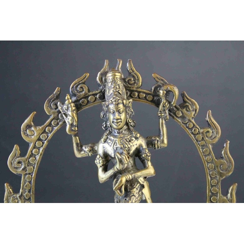 87 - Vintage Brass Statue of an Indian Deity standing on a Buddha's Back