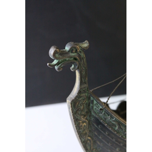 91 - Bronzed Metal Model of a Viking Boat held on a Wooden Stand, 43cms long, with makers mark for E Aaga... 