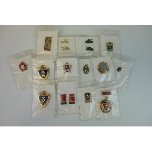 215 - Russian assorted badges, all carded including Military tankks