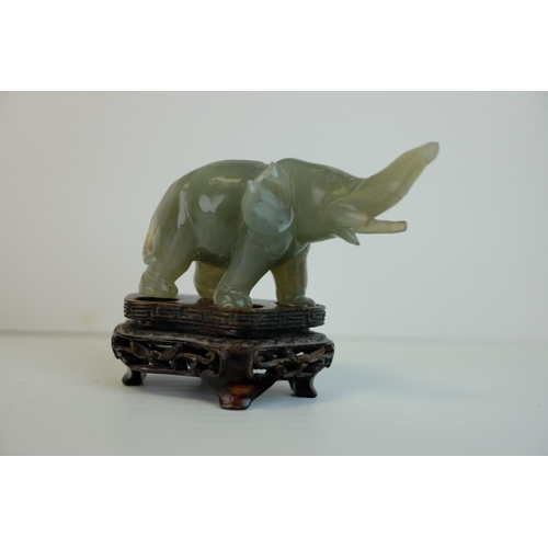 219 - Two Early 20th century Chinese / Japanese Carved Ivory Horses together with Five Jade? / Green Stone... 