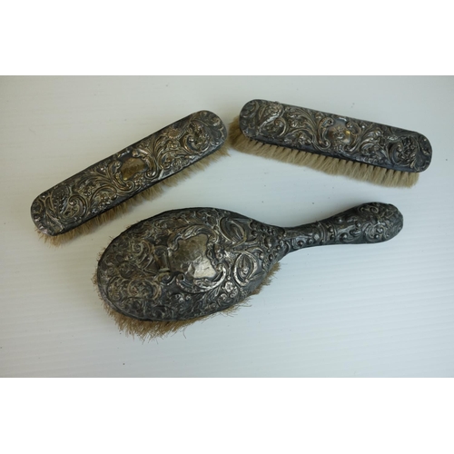 220 - Five Piece Silver Backed Dressing Table Set comprising Four Brushes and a Hand Mirror, B'ham 1916