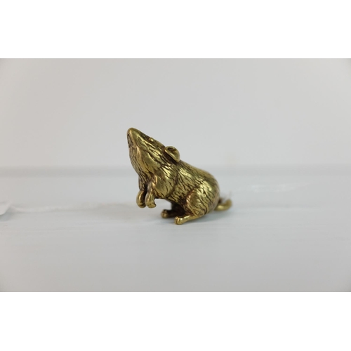 284 - A brass figure of a rat or mouse.