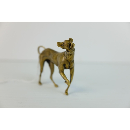 286 - A brass bronze figure of a dog.