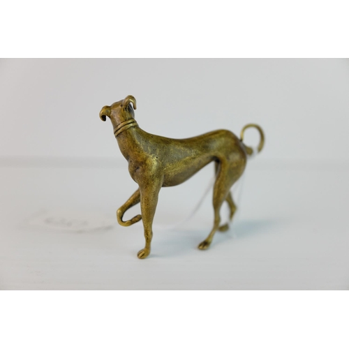 286 - A brass bronze figure of a dog.