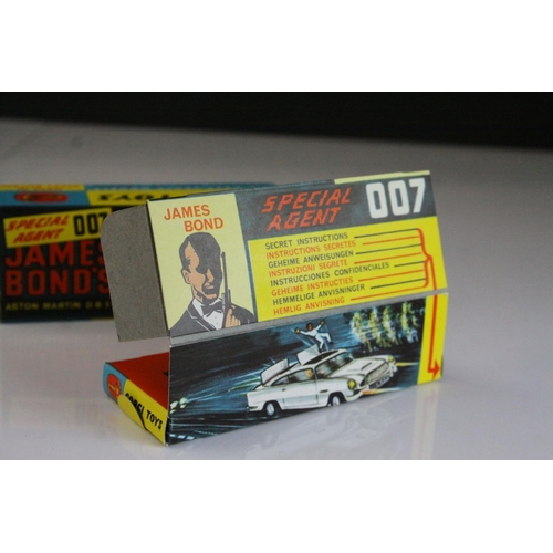 1006 - Boxed Corgi 261 James Bond 007 Aston Martin diecast model, complete with figures, unused missiles & ... 