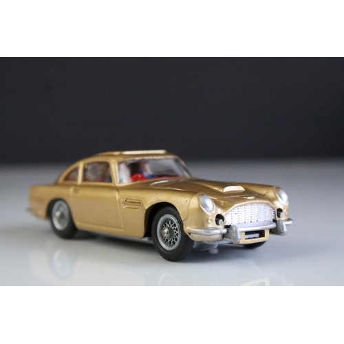 1006 - Boxed Corgi 261 James Bond 007 Aston Martin diecast model, complete with figures, unused missiles & ... 