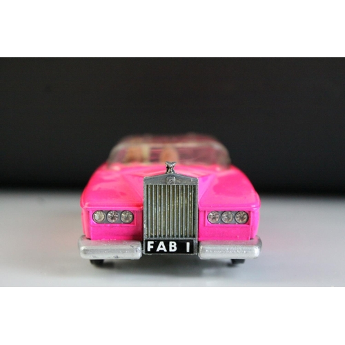 1008 - Boxed Dinky 100 Thunderbirds Lady Penelope's Fab 1 diecast model in fluorescent pink, complete with ... 