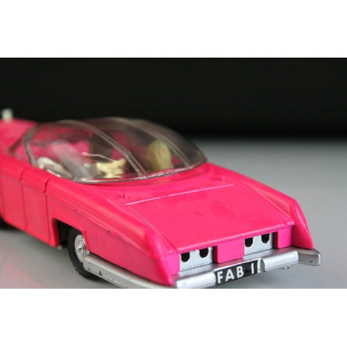 1008 - Boxed Dinky 100 Thunderbirds Lady Penelope's Fab 1 diecast model in fluorescent pink, complete with ... 