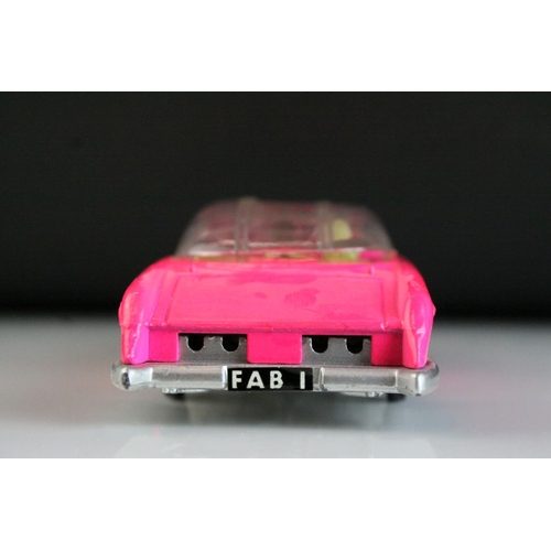 1008 - Boxed Dinky 100 Thunderbirds Lady Penelope's Fab 1 diecast model in fluorescent pink, complete with ... 