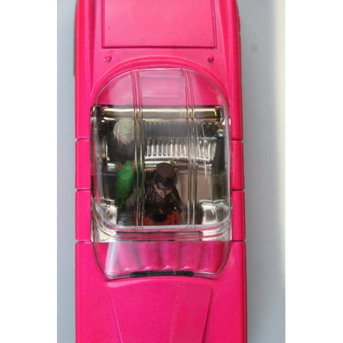 1008 - Boxed Dinky 100 Thunderbirds Lady Penelope's Fab 1 diecast model in fluorescent pink, complete with ... 