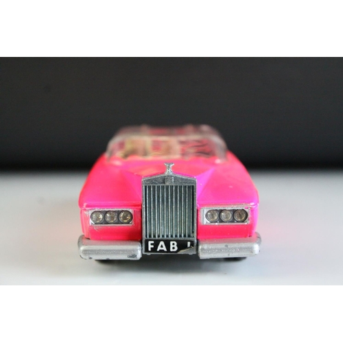 1014 - Boxed Dinky 100 Thunderbirds Lady Penelope's FAB 1 fluorescent pink diecast model, complete with inn... 