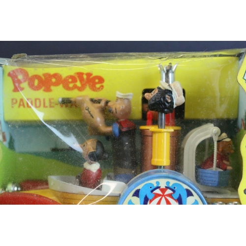 1033 - Boxed Corgi Comics 802 Popeye Paddle-Wagon complete and near mint / shop stock condition, some box w... 