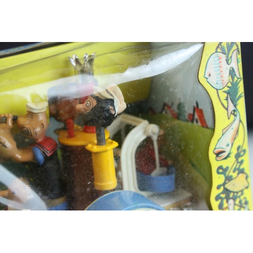 1033 - Boxed Corgi Comics 802 Popeye Paddle-Wagon complete and near mint / shop stock condition, some box w... 