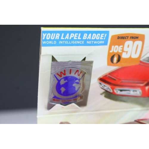 1046 - Boxed Dinky 108 Joe 90 Sam's Car diecast model in red, with inner display stand, lapel badge and ins... 