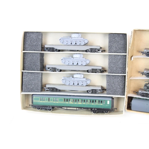 108 - Eight OO gauge items of rolling stock with 6 x military flatbeds with tanks (9 x Tanks in total) and... 