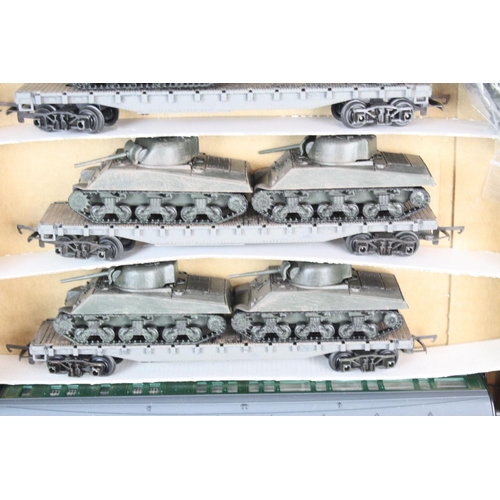 108 - Eight OO gauge items of rolling stock with 6 x military flatbeds with tanks (9 x Tanks in total) and... 