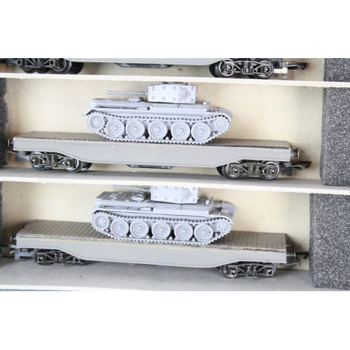 108 - Eight OO gauge items of rolling stock with 6 x military flatbeds with tanks (9 x Tanks in total) and... 