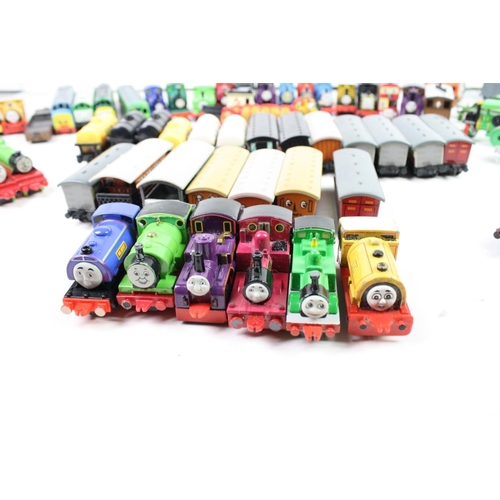 1105 - Collection of playworn Ertl Thomas the Tank Engine trains, carriages and other vehicles. Approx. 60