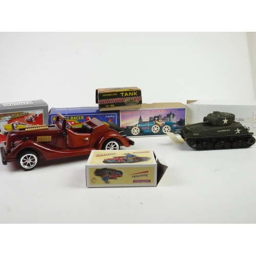 1110 - Five boxed tin plate models to include Schylling Rocket Racer, Daiya Japan Sparking Tank, Schylling ... 