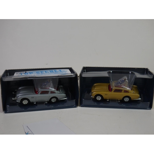 1122 - Seven boxed Corgi diecast James Bond vehicles to include four x Aston Martin D.B.5 ( 2 x 04206, CC03... 