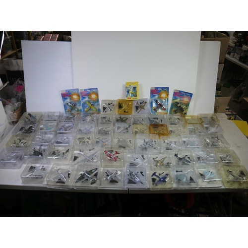 1126 - Collection of 59 boxed/bubbled diecast model planes to include 54 Del Prado Aircraft of the Aces (mo... 