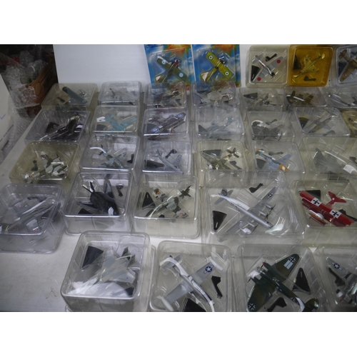 1126 - Collection of 59 boxed/bubbled diecast model planes to include 54 Del Prado Aircraft of the Aces (mo... 