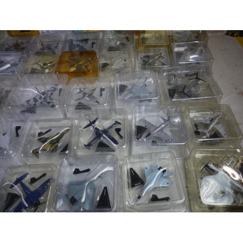 1126 - Collection of 59 boxed/bubbled diecast model planes to include 54 Del Prado Aircraft of the Aces (mo... 