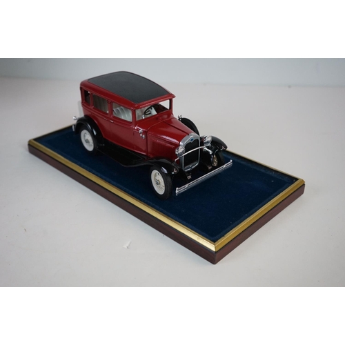 1168 - Five cased 1:18 scale diecast model vintage cars to include Mercedes, Morgan etc, models fixed to a ... 