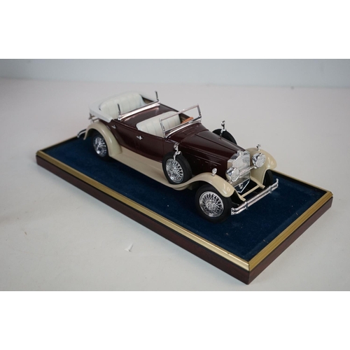 1168 - Five cased 1:18 scale diecast model vintage cars to include Mercedes, Morgan etc, models fixed to a ... 