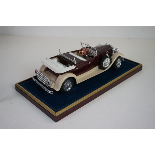 1168 - Five cased 1:18 scale diecast model vintage cars to include Mercedes, Morgan etc, models fixed to a ... 