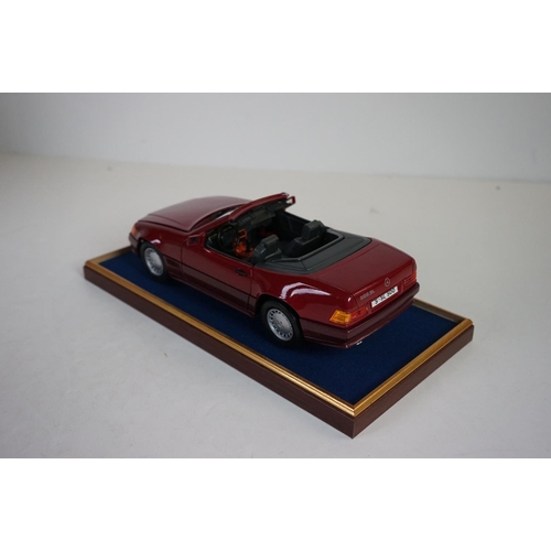 1170 - Four cased 1:18 scale diecast model classic cars to include Rolls Royce and Mercedes, models fixed t... 