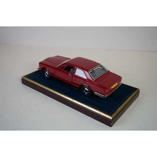 1170 - Four cased 1:18 scale diecast model classic cars to include Rolls Royce and Mercedes, models fixed t... 