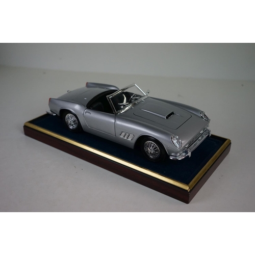 1171 - Five cased 1:18 scale diecast model classic cars, to include MG, Ferrari, Bugatti, Aston Martin & Me... 