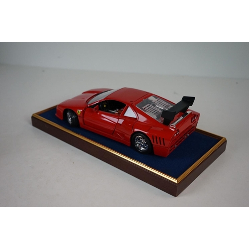 1171 - Five cased 1:18 scale diecast model classic cars, to include MG, Ferrari, Bugatti, Aston Martin & Me... 