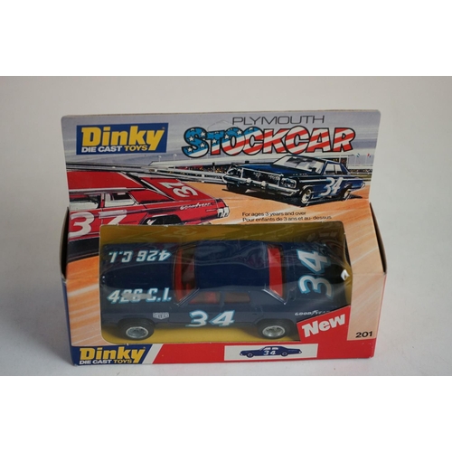 1180 - Four boxed Dinky diecast models to include 201 Plymouth Stock Car x3 & 390 Customised Freeway Cruise... 