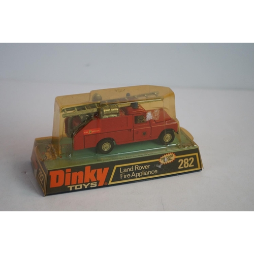 1182 - Five boxed diecast models to include Dinky 282 Land Rover Fire Appliance x2, 211 Triumph TR7 Sports ... 