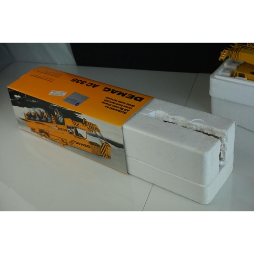 1228 - Two boxed 1/50 Conrad Demag diecast construction models to include 2081 AC335 and 2081 AC435, some p... 