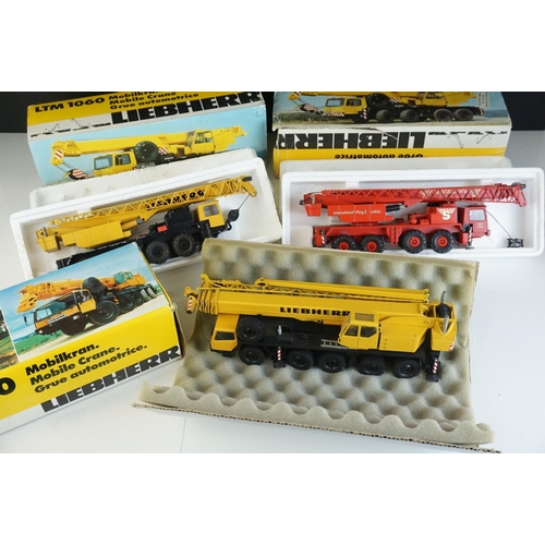 1229 - Three boxed 1/50 Conrad Liebherr diecast construction models to include 2 x LTM 1060 (variants) and ... 