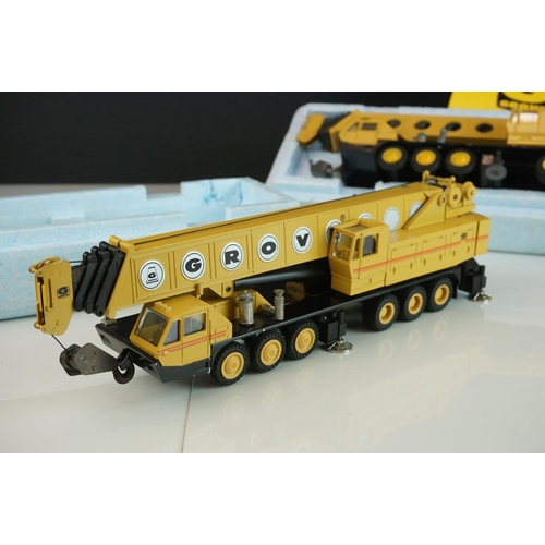 1232 - Two boxed 1/50 NZG Grove diecast construction models to include 152 TM 1500 & TM1400, some paint los... 