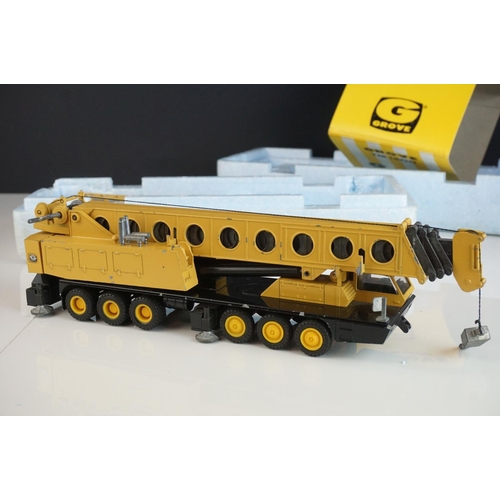 1232 - Two boxed 1/50 NZG Grove diecast construction models to include 152 TM 1500 & TM1400, some paint los... 