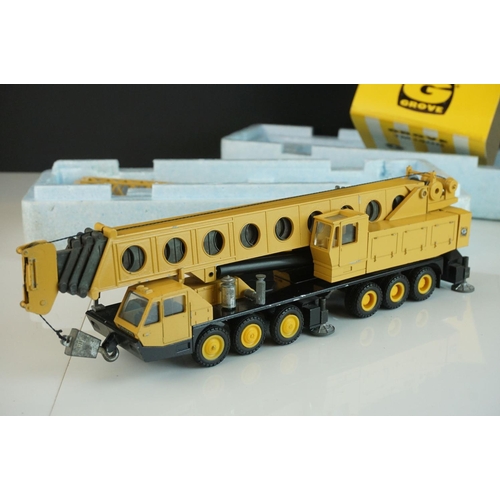 1232 - Two boxed 1/50 NZG Grove diecast construction models to include 152 TM 1500 & TM1400, some paint los... 